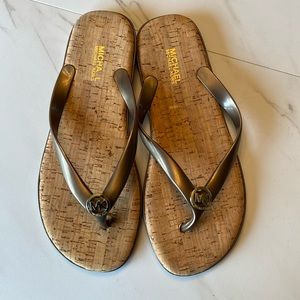 Michael Kors women’s bronze flip flops size 7